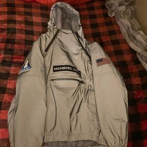 Reflective members only puffer jacket